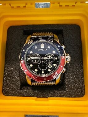 Invicta Pro Diver Black Dial Chronograph Watch with Red and Blue Bezel 52mm.